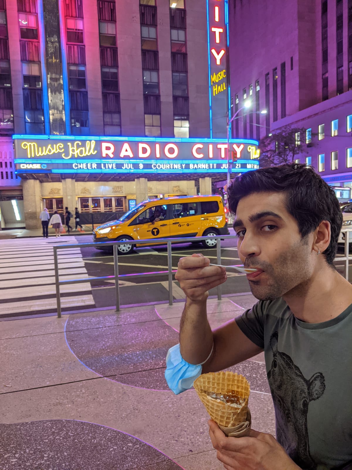 Juan eating Ice Cream in front of Radio City Music Hall