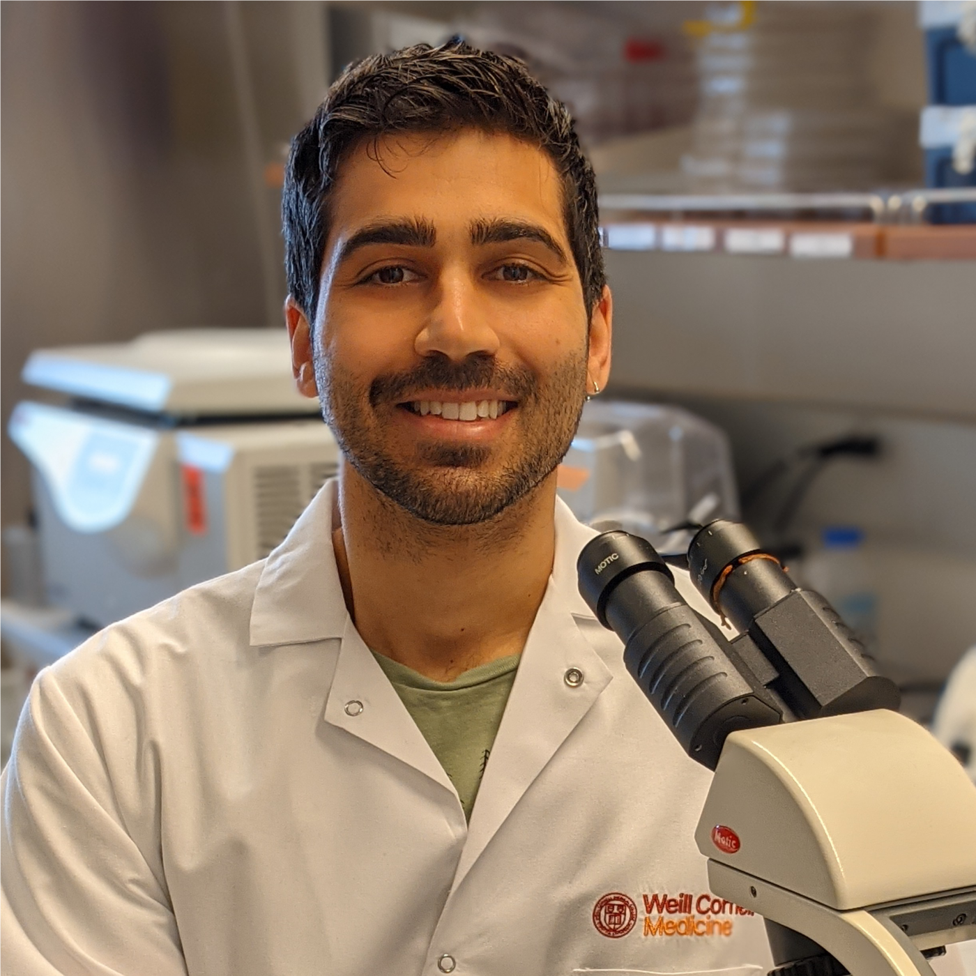 Headshot of Juan in his lab